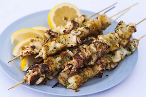 Calamari Skewers with lemon wedges -  Primo Estate